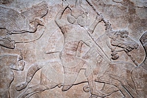 Ancient persian bas-relief depicting warriors on horseback