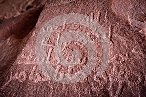 Ancient Petroglyphs at Khazali canyon at Wadi Rum desert in Jordan