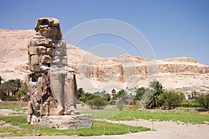 Ancient Pharaoh statue and column