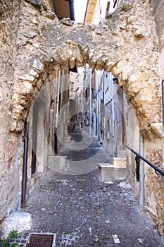 Ancient picturesque narrow street, Scanno, Italy photo