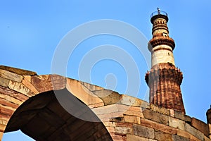 ancient pillars with an infinite viewer near the Qutub Minar Columns with stone carving Qutub Minar or Qutub photo