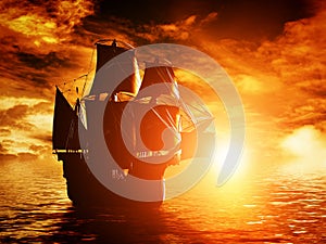 Ancient pirate ship sailing on the ocean at sunset photo