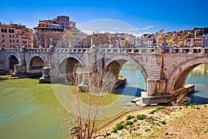 Ancient Ponte Sant Angelo stone bridge on Tiber river of Rome