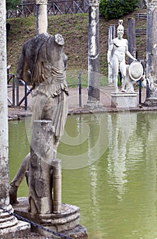 Ancient Pool Canopus, surrounded by greek sculptures in Hadrian`s Villa Villa Adriana, 2nd century AD, Tivoli, Italy,UNESCO Worl