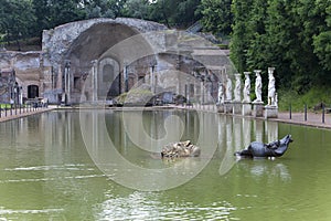 Ancient Pool Canopus, surrounded by greek sculptures in Hadrian`s Villa Villa Adriana, 2nd century AD, Tivoli, Italy UNESCO Worl