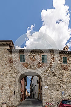 The ancient Porta Senese and the surrounding walls of the historic center of Castiglione del Lago, Umbria, Italy