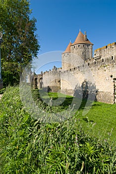 Ancient rampart and tower of Carcassonne chat