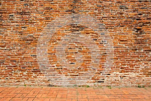 Ancient red bricks wall background.