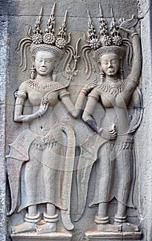 Ancient reliefs at Angkor Wat Temple, Cambodia photo