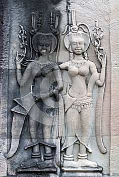 Ancient reliefs at Angkor Wat Temple, Cambodia photo