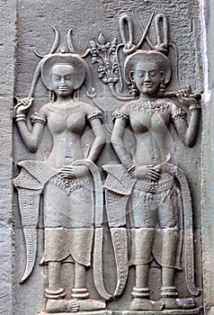 Ancient reliefs at Angkor Wat Temple, Cambodia photo