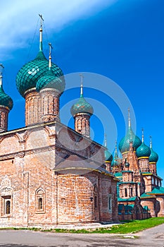 Ancient repairing church of red brick in sunny day