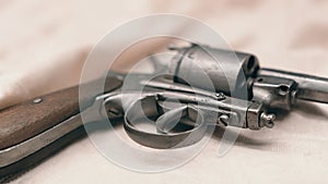 Ancient revolver. Old gun.