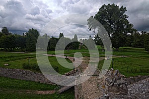 Ancient road through the park to the Church of Exaltation of the Holy and St. Joseph. View from terrace of Pidhirtsi Castle.