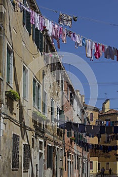 Ancient road in Venice with cloths hang out to dry