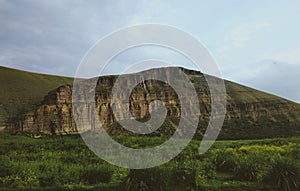 Ancient rock located in a picturesque place right in the center of Siberia