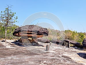 The ancient rock naturally occurring but modified by a human