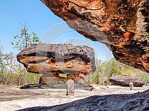 The ancient rock naturally occurring but modified by a human