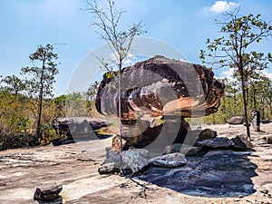 The ancient rock naturally occurring but modified by a human