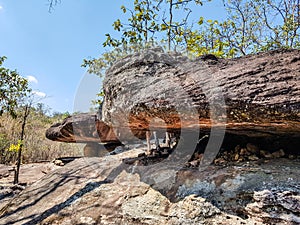 The ancient rock naturally occurring but modified by a human