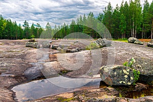 Ancient rock paintings petroglyphs in the Belomorsky region of Karelia.