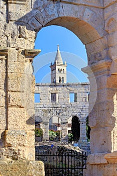 Ancient Roman Amphitheater and Church Bell Tower in Pula, Istria, Croatia, Europe