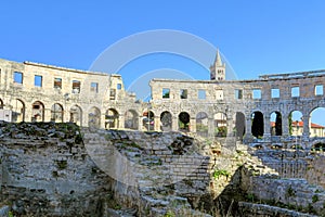 Ancient Roman Amphitheater and Church Bell Tower in Pula, Istria, Croatia, Europe