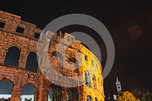 Ancient Roman Amphitheater at night in Pula, Istrian Peninsula in Croatia