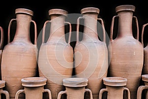 Ancient roman amphorae stored at hold ship as ancient times trad