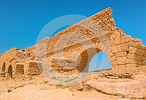 Ancient Roman aqueduct in Caesarea National Park, Israel