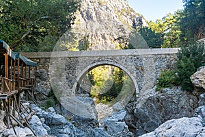Ancient Roman bridge over a mountain river in the Kesme Bogazi canyon, Turkey