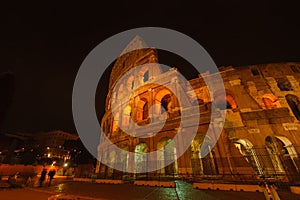 Ancient roman colosseum at dusk, Rome, Italy