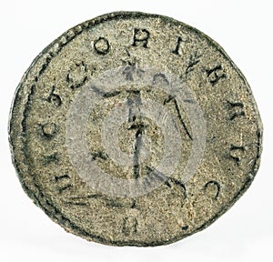 Ancient Roman copper coin of Emperor Aurelian, AE Denarius isolated on a white background