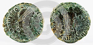 Ancient Roman copper coin of Emperor Theodosius I on an isolated background