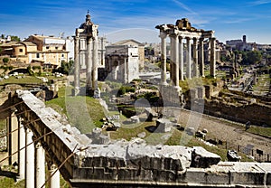 Ancient Roman Forum and visible Colosseum in the far background in Rome, Italy