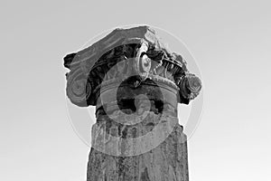 Ancient roman greek column with broken chapiter. Pompeii, Italy. Black and white photo photo