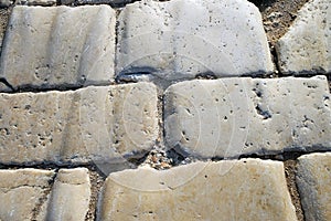 Ancient Roman pavement with traces of chariots