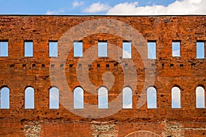 Ancient roman red brick wall with windows