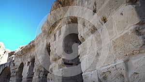 Ancient Roman ruins. Ancient amphitheater located in El Jem, Tunis. Passage along the wall. Historic Landmark..