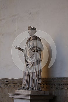 Ancient Roman sculpture of a Vestal Virgin at the Loggia dei Lanzi, Florence, Italy