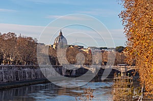 Ancient Roman stone bridge over the Tiber River, Rome, Italy