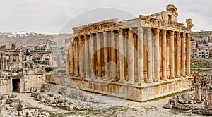 Ancient Roman temple of Bacchus with surrounding ruins and city, Bekaa Valley, Baalbek, Lebanon photo