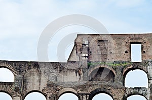 Ancient romans arch in colosseum, rome, italy