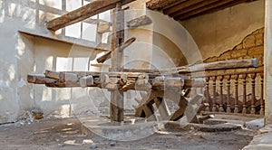 Ancient rotary Flour Mill used to be rotated by animal power in front of El Sehemy historic house, Cairo, Egypt photo