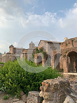 Ancient ruin of Tempio di Romolo and part of Basilica di Massenzio in the Roman Forum, Rome, Italy