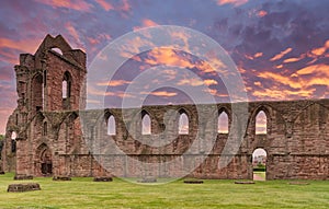 Ancient Ruins of Arbroath Abbey at Sunset in Scotland