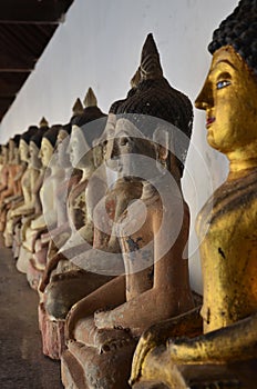 Ancient ruins buddha statue in antique building ubosot for thai people foreign travelers travel visit and respect praying blessing