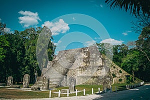 Ancient ruins of Complejo Q, located in the ancient Mayan city of Tikal in Guatemala photo