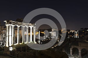 Ancient ruins at forum romanum in Rome at night