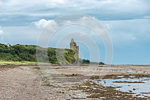 The Ancient Ruins of Greenan Castle looking over From Greenan Bay in Ayrshire Scotland